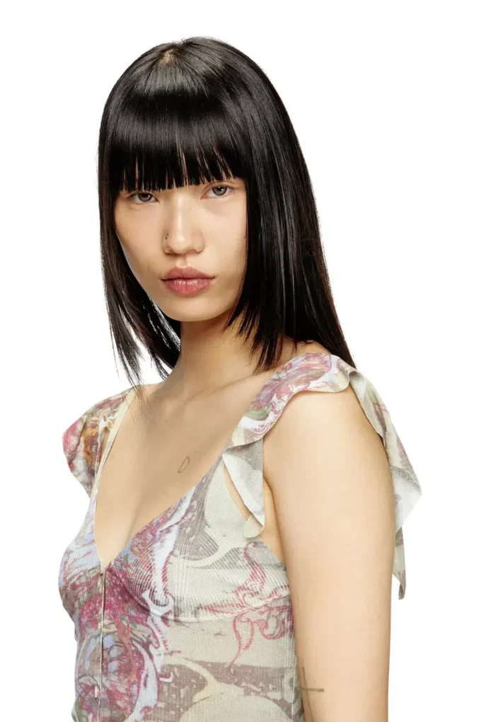 m-fiore Ruffle-shoulder knit top with medieval print