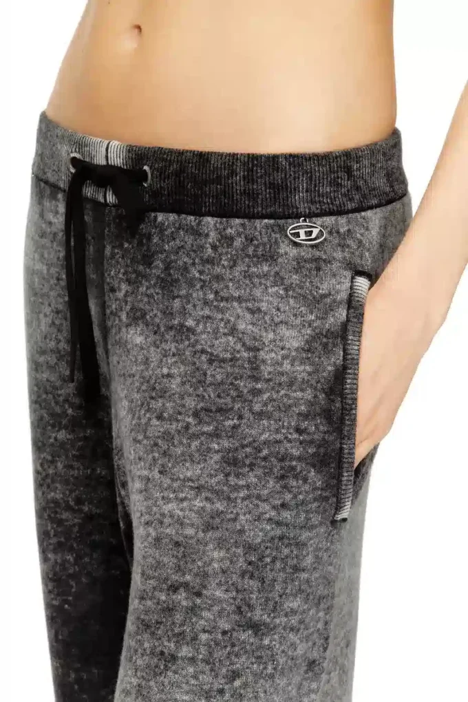 m-honorine Reverse-print knitted wool track pants
